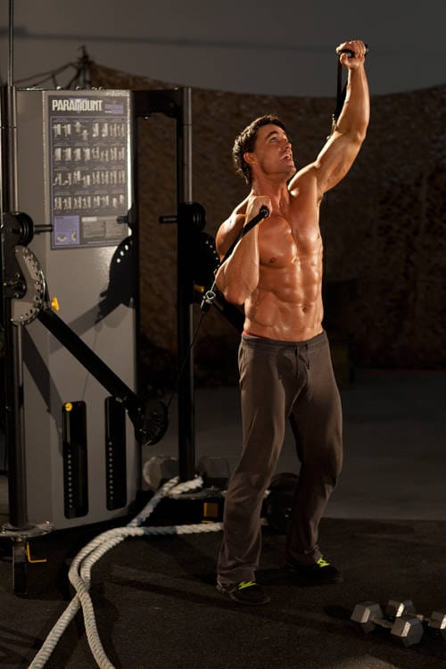 Alternating Cable Shoulder Press - Step 1
