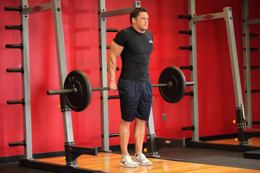 Barbell Shrug Behind The Back - Step 1