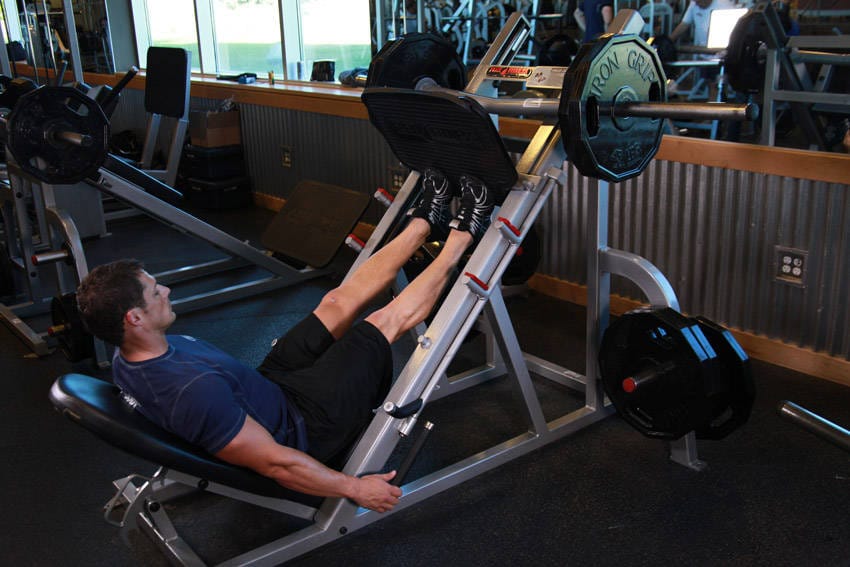 Calf Press On The Leg Press Machine - Step 1