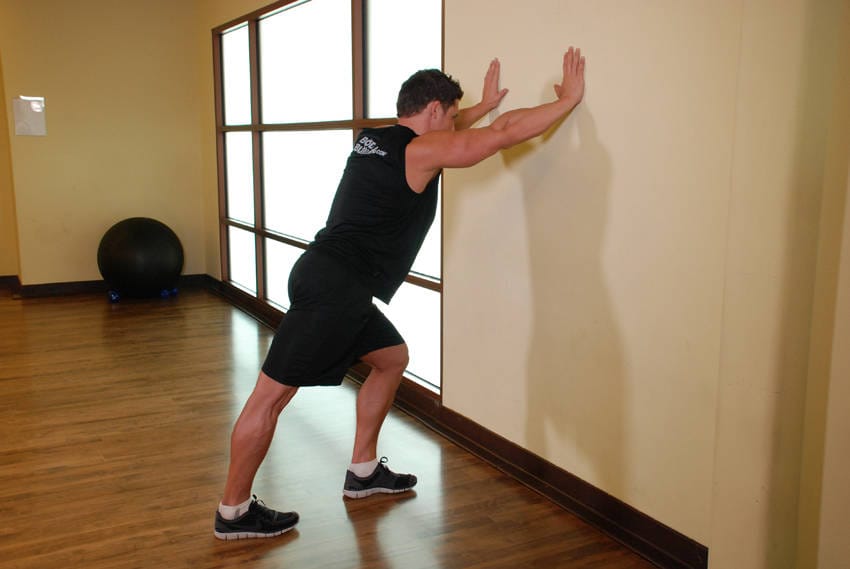 Calf Stretch Hands Against Wall - Step 0