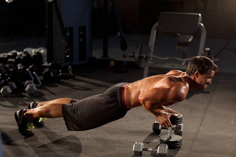 Close-Grip Push-Up off of a Dumbbell - Step 1