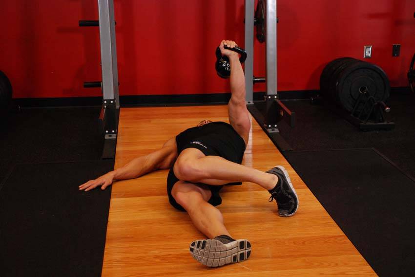Extended Range One-Arm Kettlebell Floor Press - Step 1
