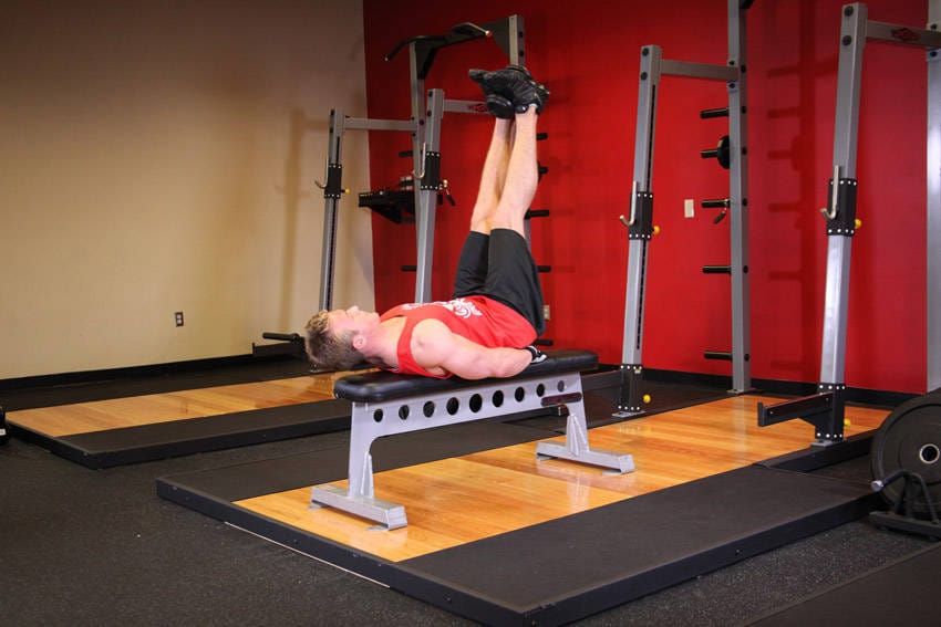 Flat Bench Lying Leg Raise - Step 1