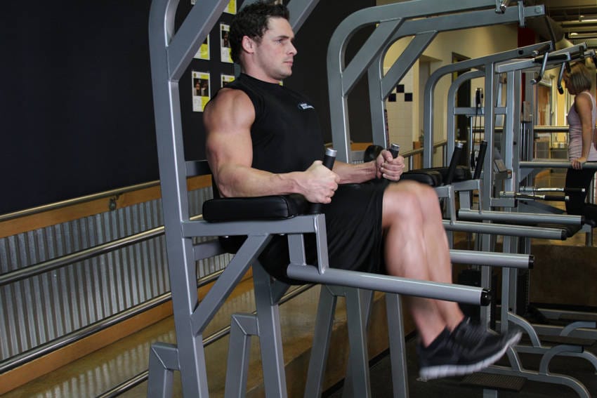 Knee/Hip Raise On Parallel Bars - Step 1
