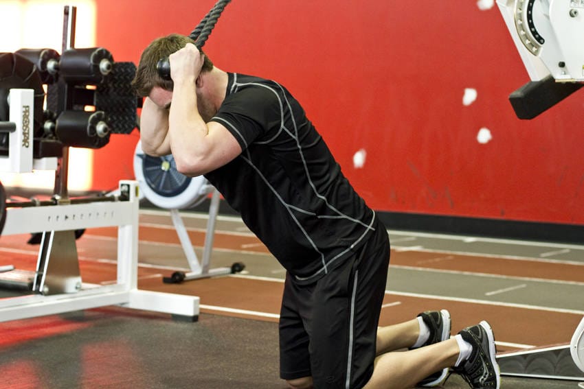 Kneeling Cable Crunch With Alternating Oblique Twists - Step 0