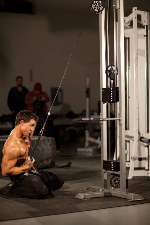 Kneeling Single-Arm High Pulley Row - Step 1