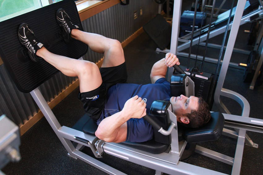 Lying Machine Squat - Step 0