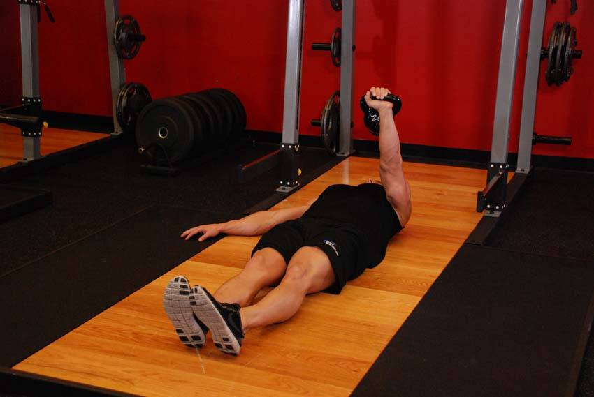 One-Arm Kettlebell Floor Press - Step 1