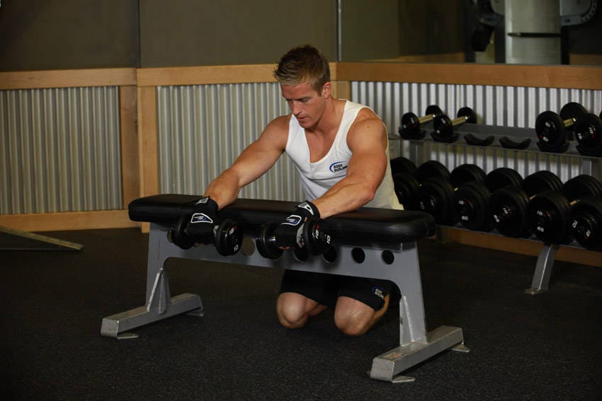 Palms-Down Dumbbell Wrist Curl Over A Bench - Step 0