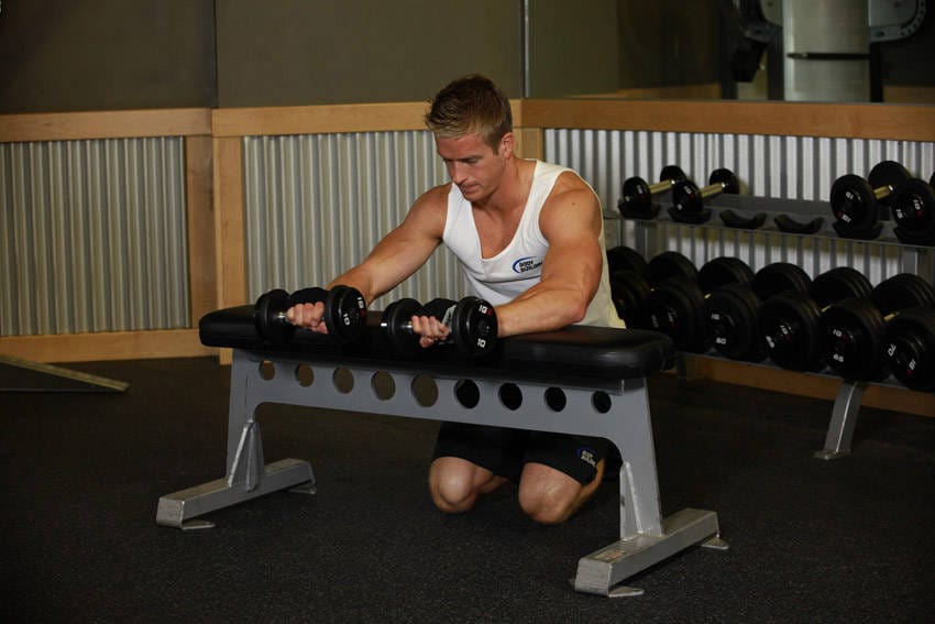 Palms-Down Dumbbell Wrist Curl Over A Bench - Step 1