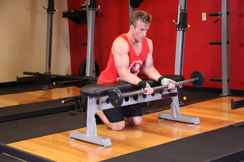 Palms-Up Barbell Wrist Curl Over A Bench - Step 0