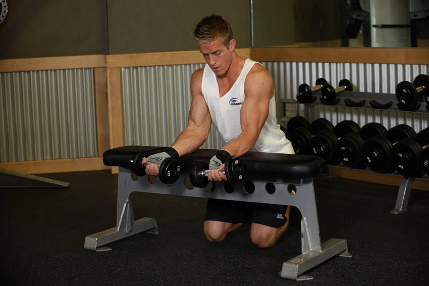 Palms-Up Dumbbell Wrist Curl Over A Bench - Step 0