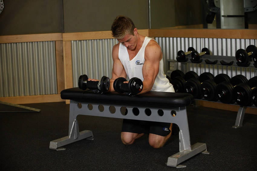 Palms-Up Dumbbell Wrist Curl Over A Bench - Step 1