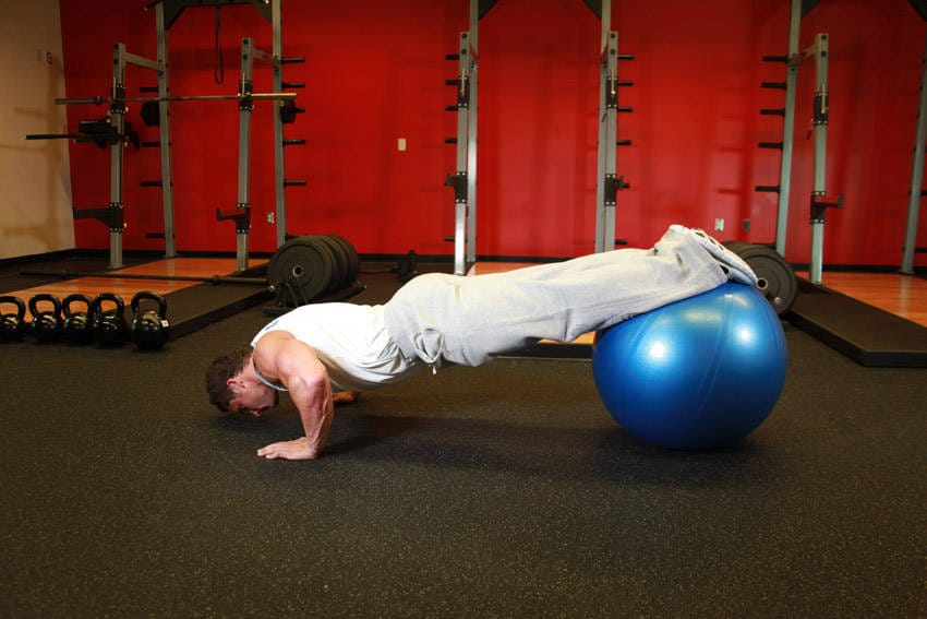 Push-Ups With Feet On An Exercise Ball - Step 0