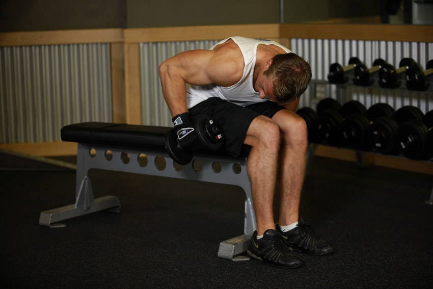Seated Bent-Over One-Arm Dumbbell Triceps Extension - Step 0