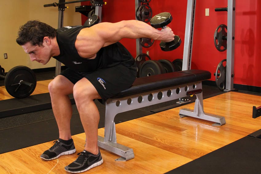Seated Bent-Over Two-Arm Dumbbell Triceps Extension - Step 1