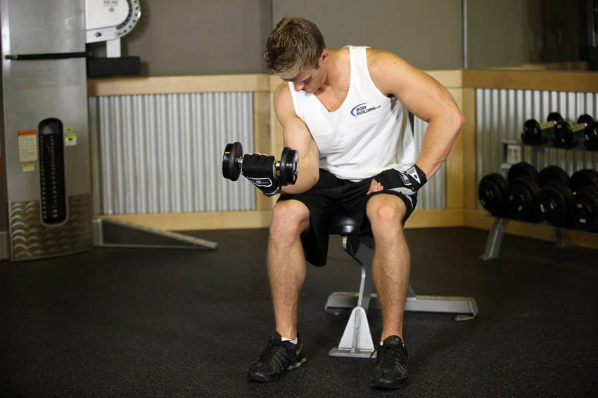 Seated One-Arm Dumbbell Palms-Up Wrist Curl - Step 1