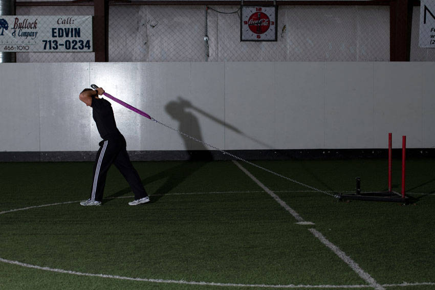 Sled Overhead Triceps Extension - Step 0