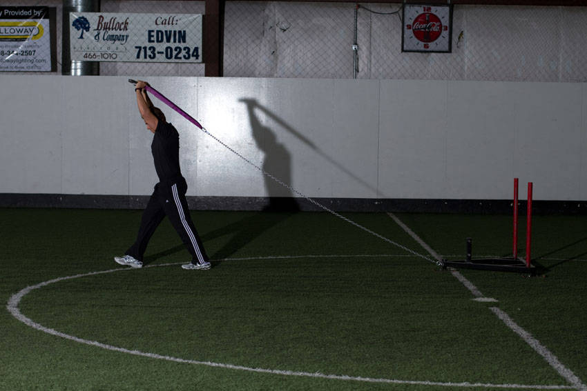 Sled Overhead Triceps Extension - Step 1