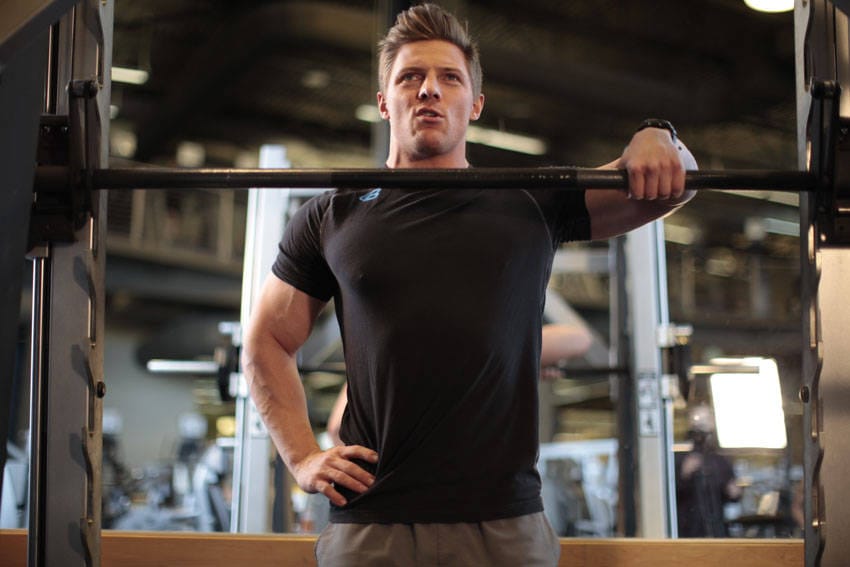 Smith Machine One-Arm Upright Row - Step 1