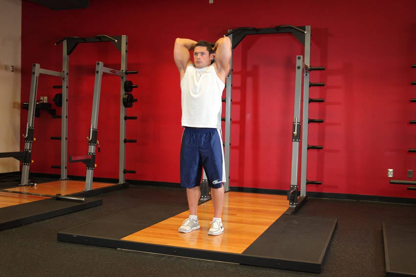 Standing Dumbbell Triceps Extension - Step 1
