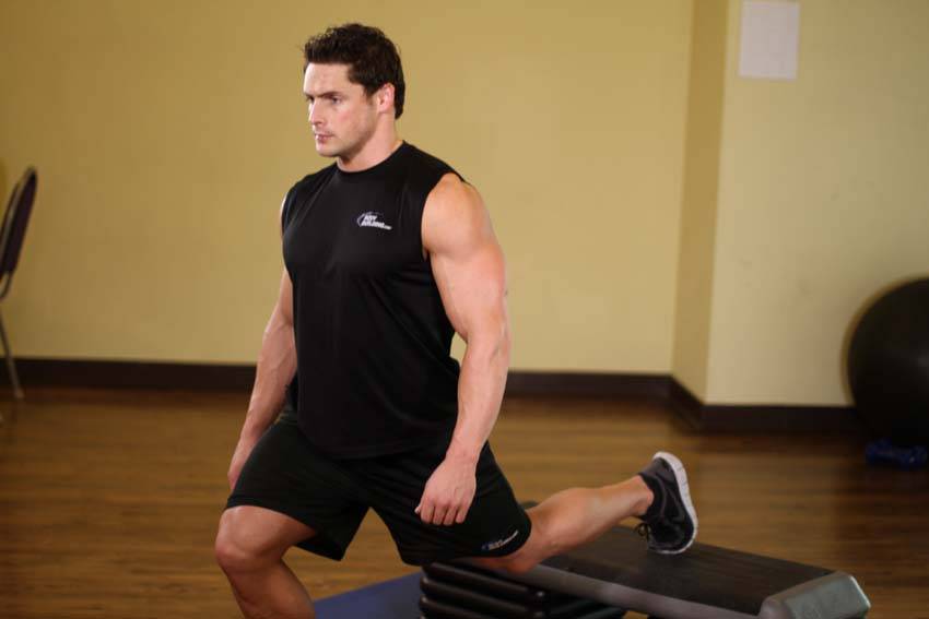 Standing Elevated Quad Stretch - Step 1