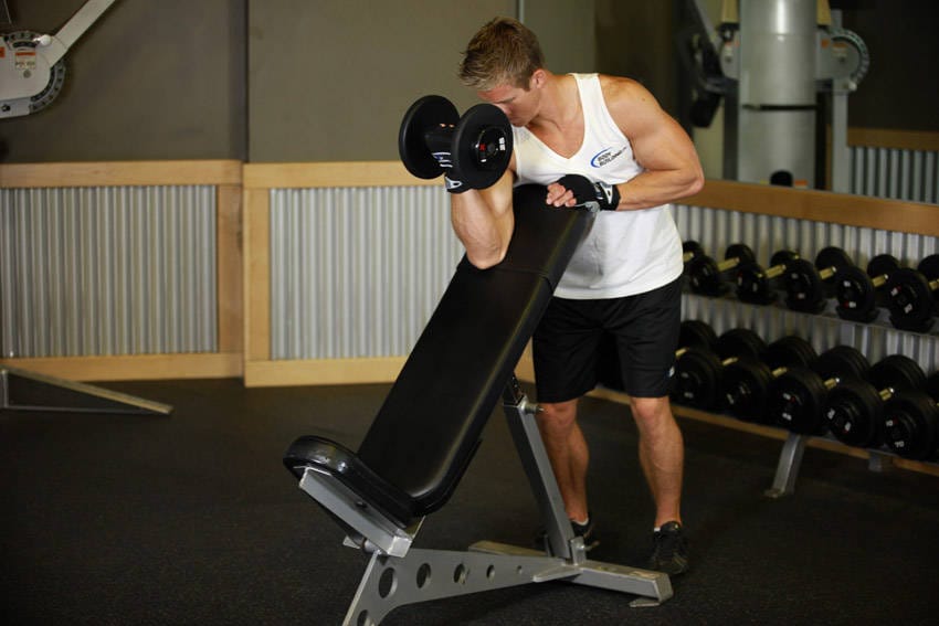 Standing One-Arm Dumbbell Curl Over Incline Bench - Step 1