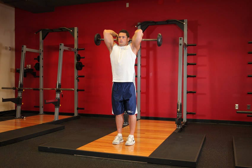 Standing Overhead Barbell Triceps Extension - Step 0