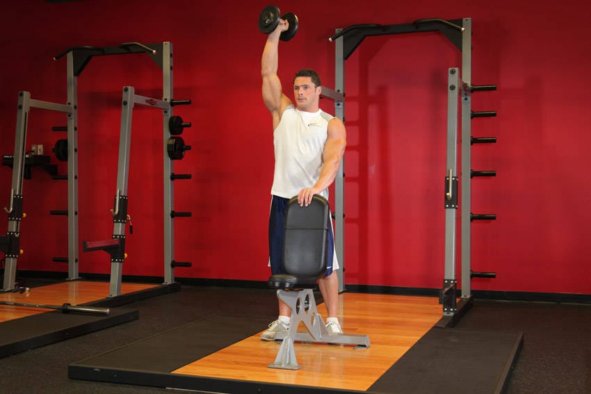 Standing Palm-In One-Arm Dumbbell Press - Step 1
