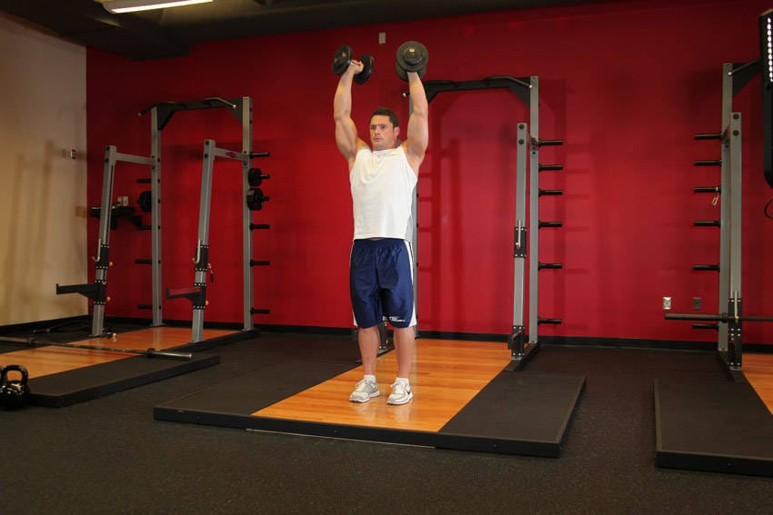 Standing Palms-In Dumbbell Press - Step 0