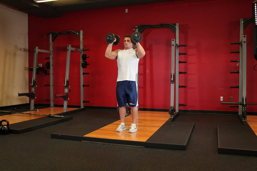 Standing Palms-In Dumbbell Press - Step 1