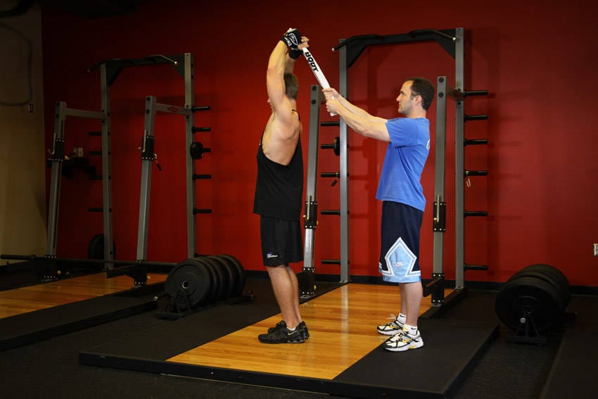 Standing Towel Triceps Extension - Step 1