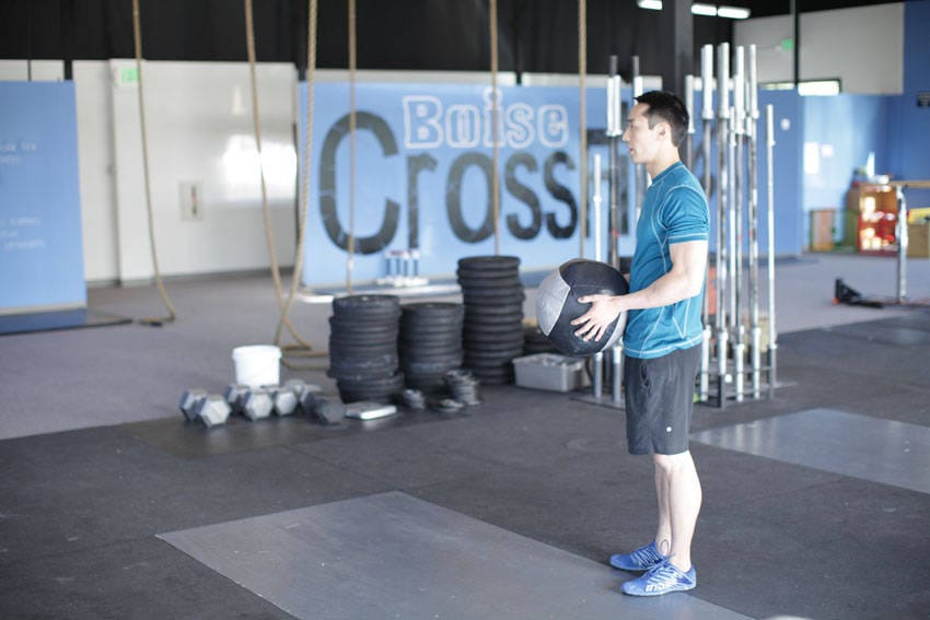 Standing Two-Arm Overhead Throw - Step 0