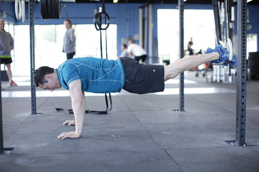Suspended Reverse Crunch - Step 0