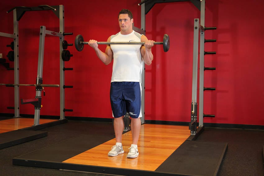 Wide-Grip Standing Barbell Curl - Step 1