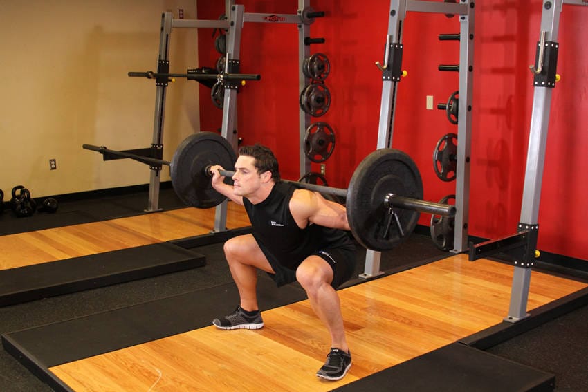 Wide Stance Barbell Squat - Step 1